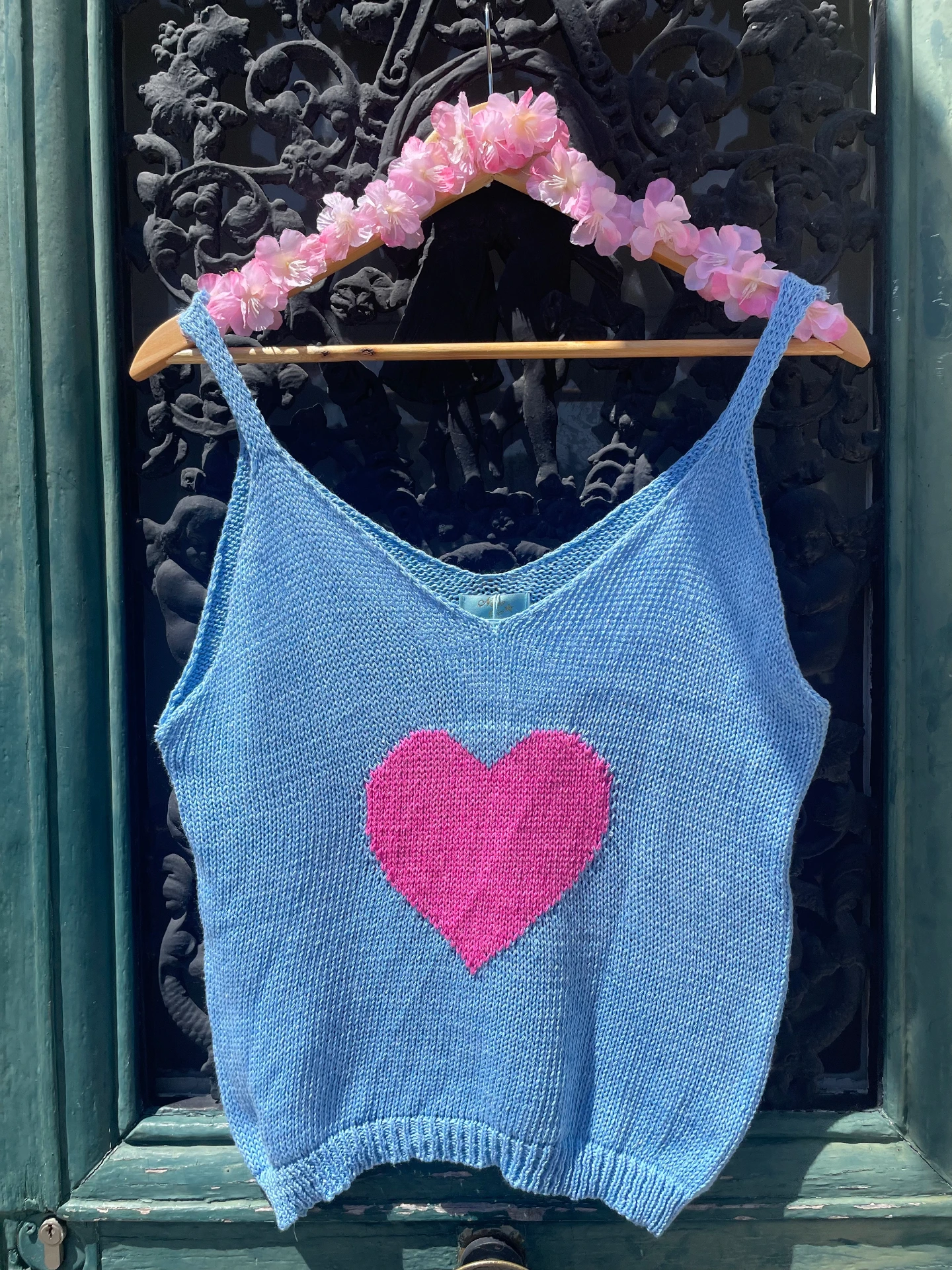 Top en maille coeur