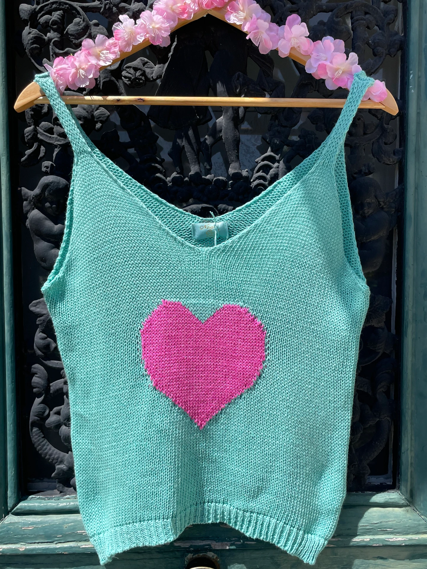 Top en maille coeur